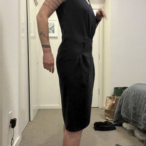 Chic tailored dress with fun front pocket